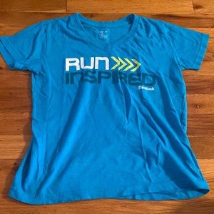 Reebok blue v-neck tee shirt